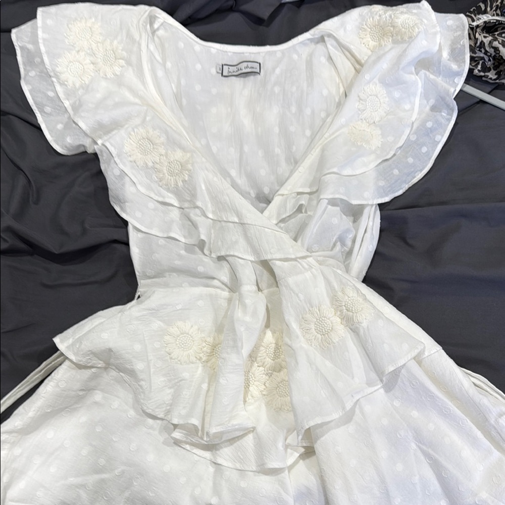 Chic White Dress with Floral Accents